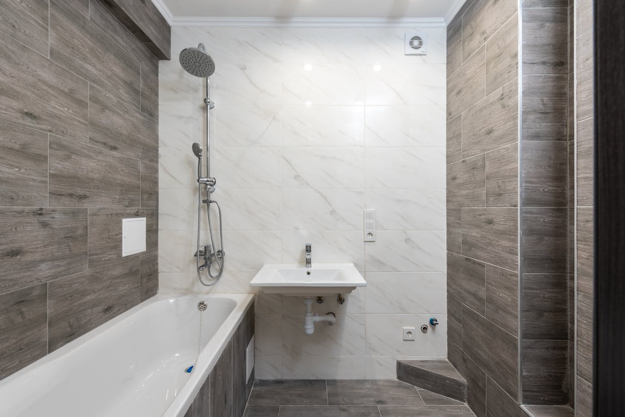 Crafting Captivating Headlines: Your awesome post title goes here Elegant modern bathroom interior with wooden details and sleek design.